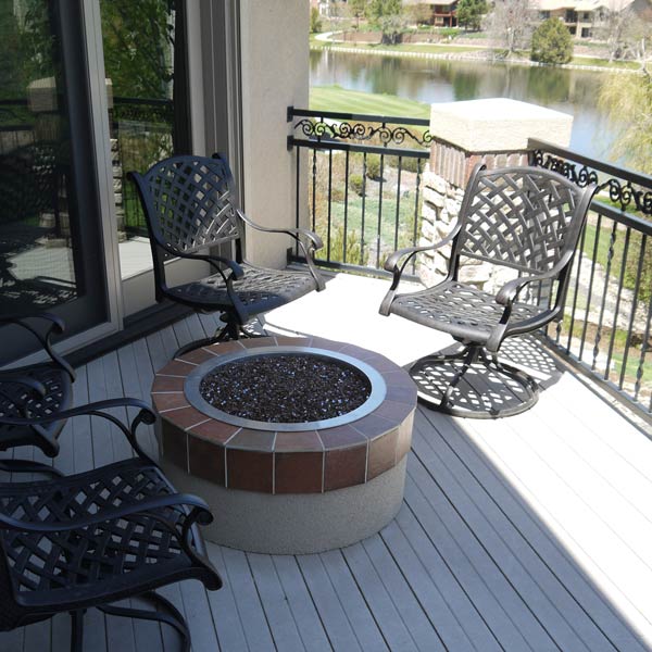 Stone Outdoor Fireplace On Low Maintenance Deck Archadeck